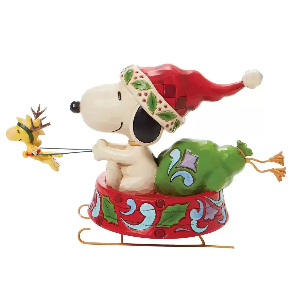 Peanuts - Jim Shore - Santa Snoopy in Dog Bowl Sled