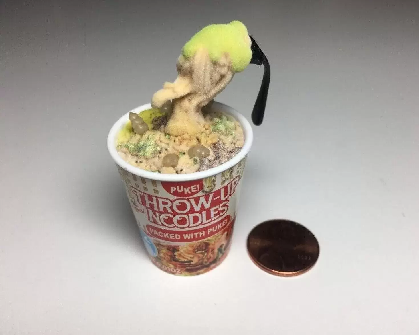 Throw-Up Noodles Packed With Puke Moldy - Mega Gross Minis action figure